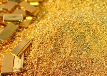 Oro se encamina a una caída semanal tras alzas de tasas y avance del dólar